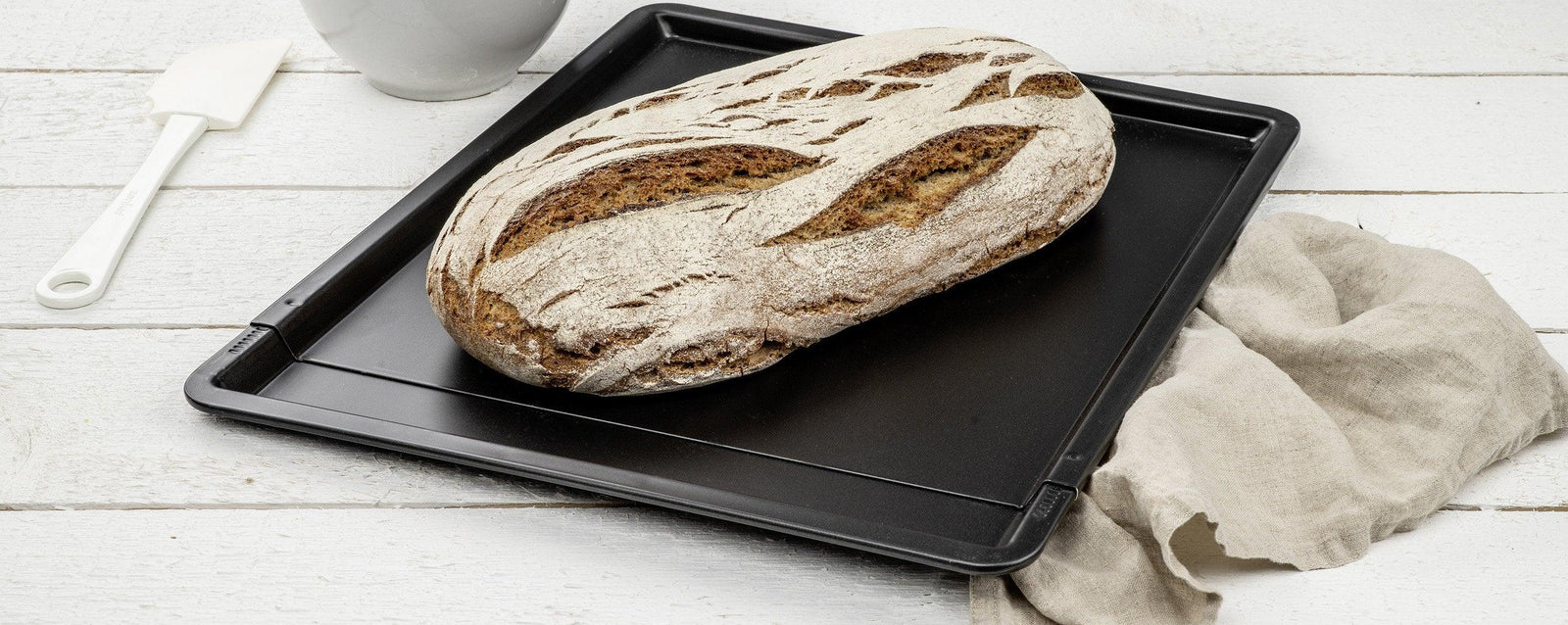 Moules à gâteaux et plaques à pâtisserie extensibles