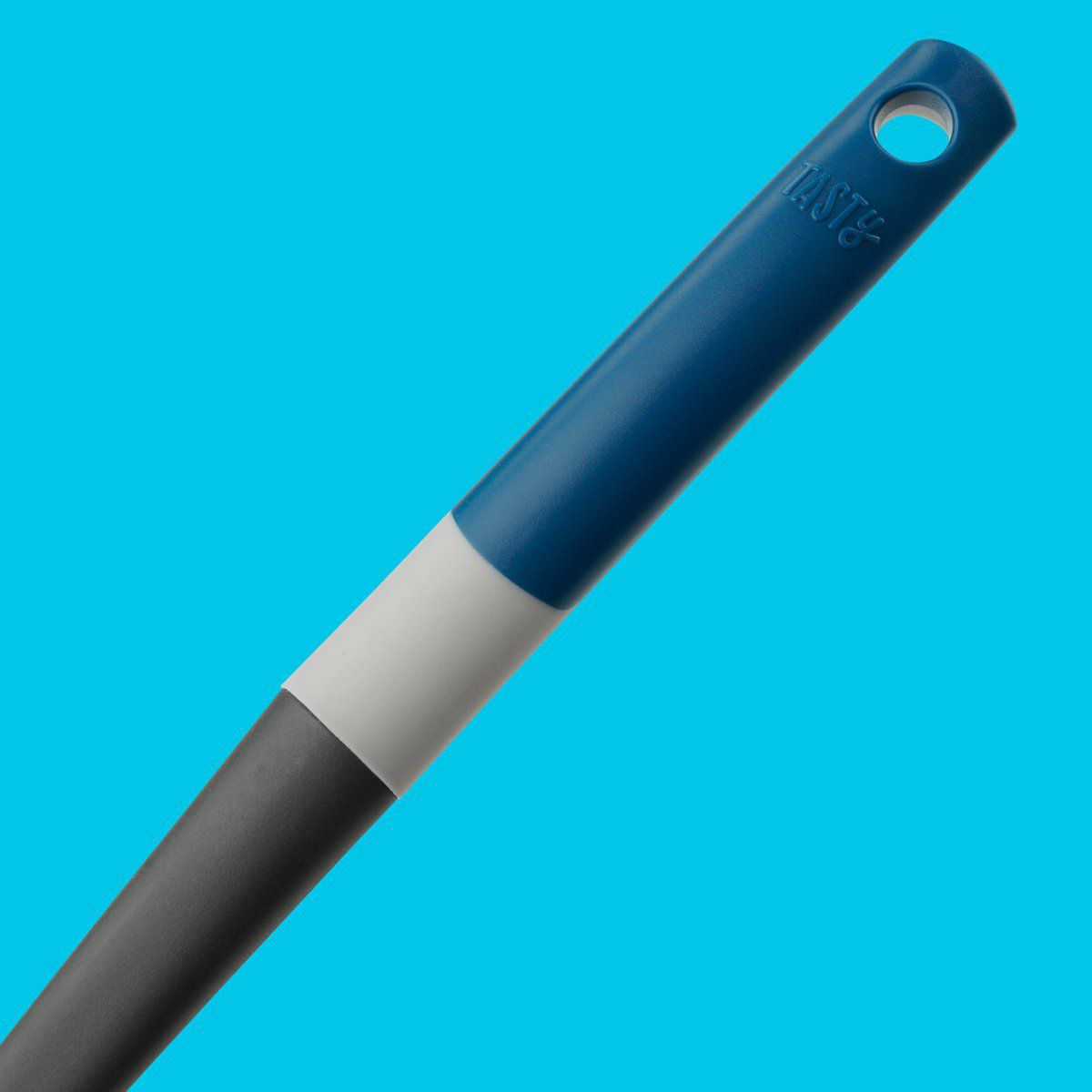 Cuillère doseuse manche bleu foncé 34 cm Tasty Core